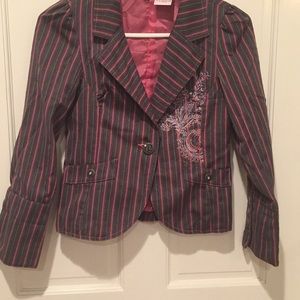 Tailored cropped cinched blazer.